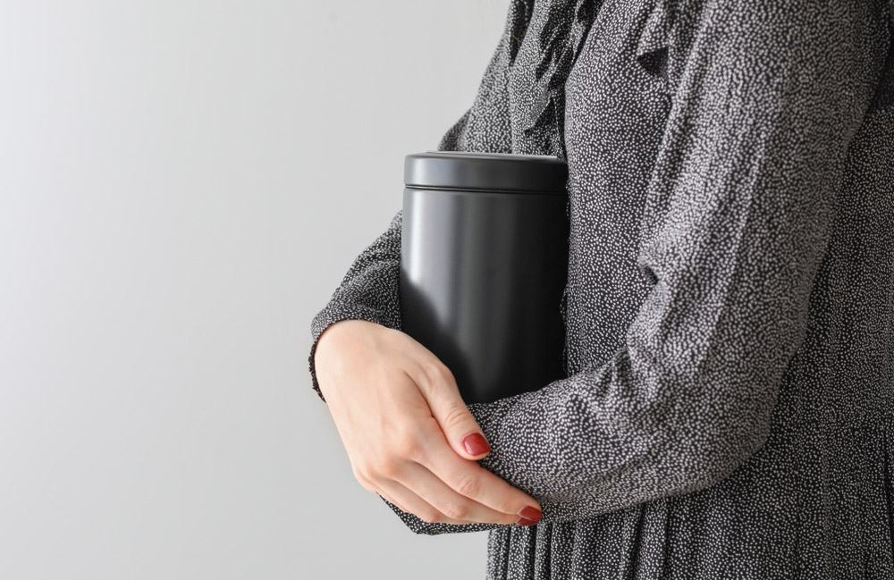 Woman With Mortuary Urn